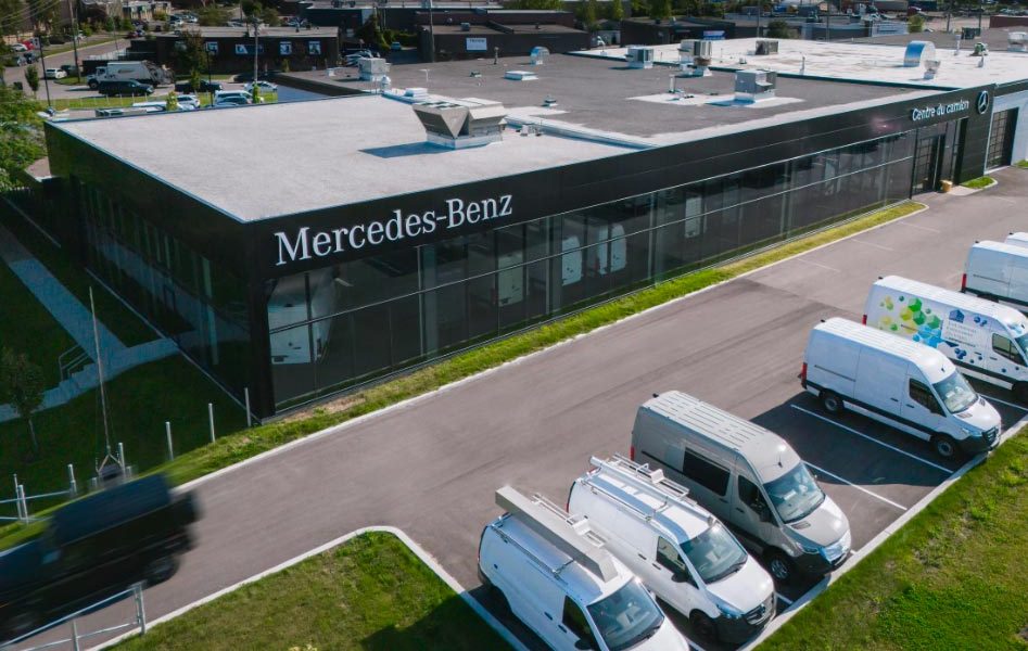 Mercedes-Benz Truck Center dealership with commercial vehicles parked outside
